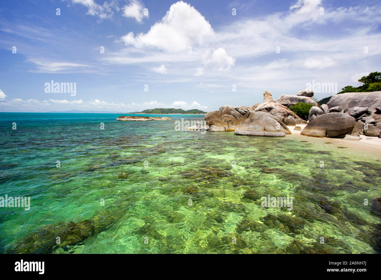 Hin Ta and Hin Yai or Grandfather and Grandmother rocks on Koh Samui island in Thailand, turquoise crystal clear sea water tropical beach landscape Stock Photo