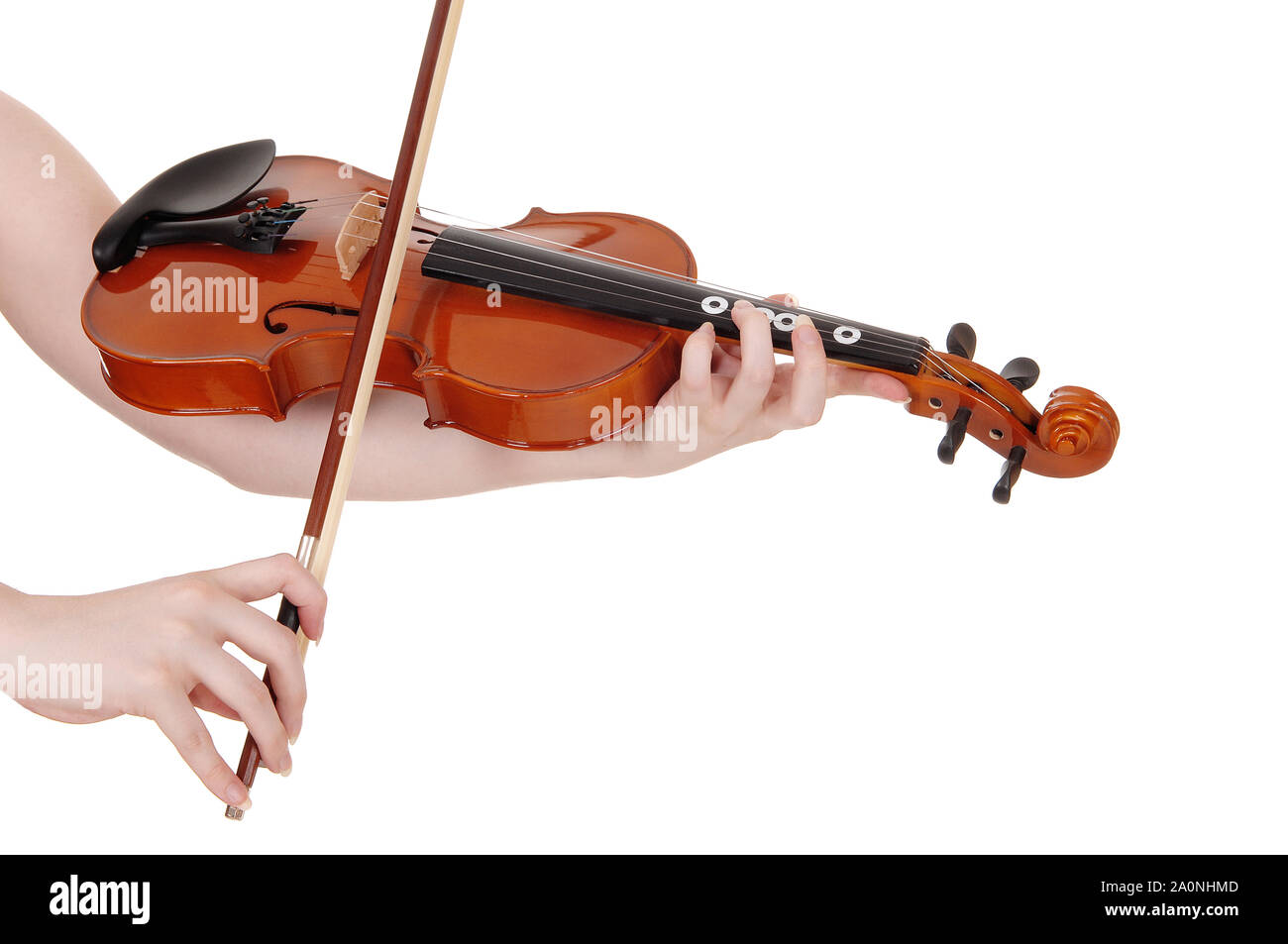 A womans hand holding and playing the violin in a close up image, horizontal , isolated for white background Stock Photo