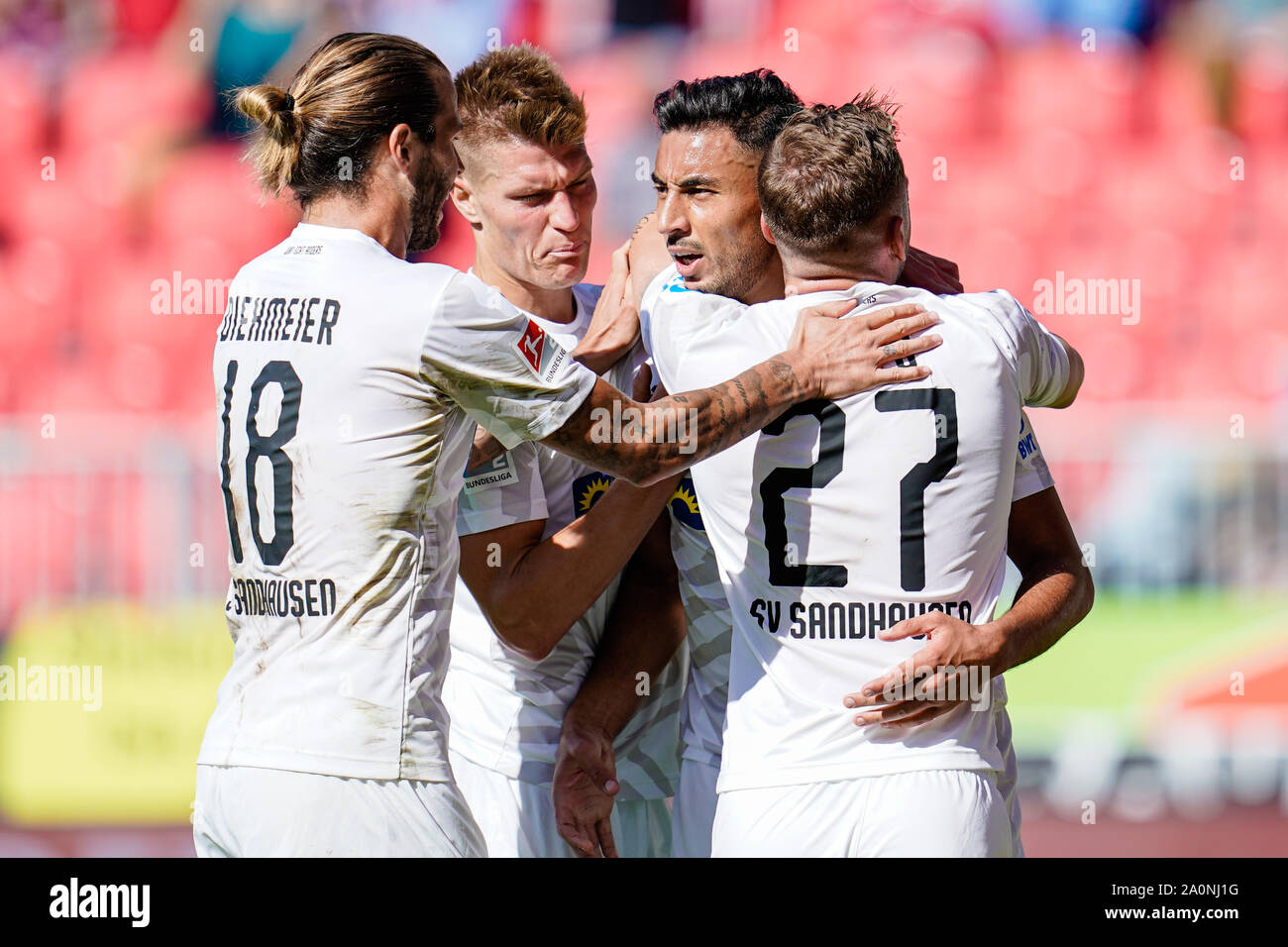 Sandhausen, Germany. 21st Sep, 2019. Soccer: 2nd Bundesliga, SV Sandhausen - VfL Bochum, 7th matchday, in Hardtwaldstadion. Sandhausens Aziz Bouhaddouz (2nd from right) cheers with his team-mates over the goal to 1:1. Credit: Uwe Anspach/dpa - IMPORTANT NOTE: In accordance with the requirements of the DFL Deutsche Fußball Liga or the DFB Deutscher Fußball-Bund, it is prohibited to use or have used photographs taken in the stadium and/or the match in the form of sequence images and/or video-like photo sequences./dpa/Alamy Live News Stock Photo