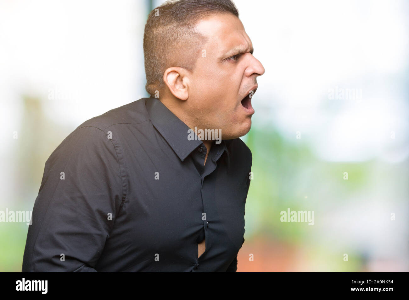 Handsome middle age arab business man over isolated background with ...