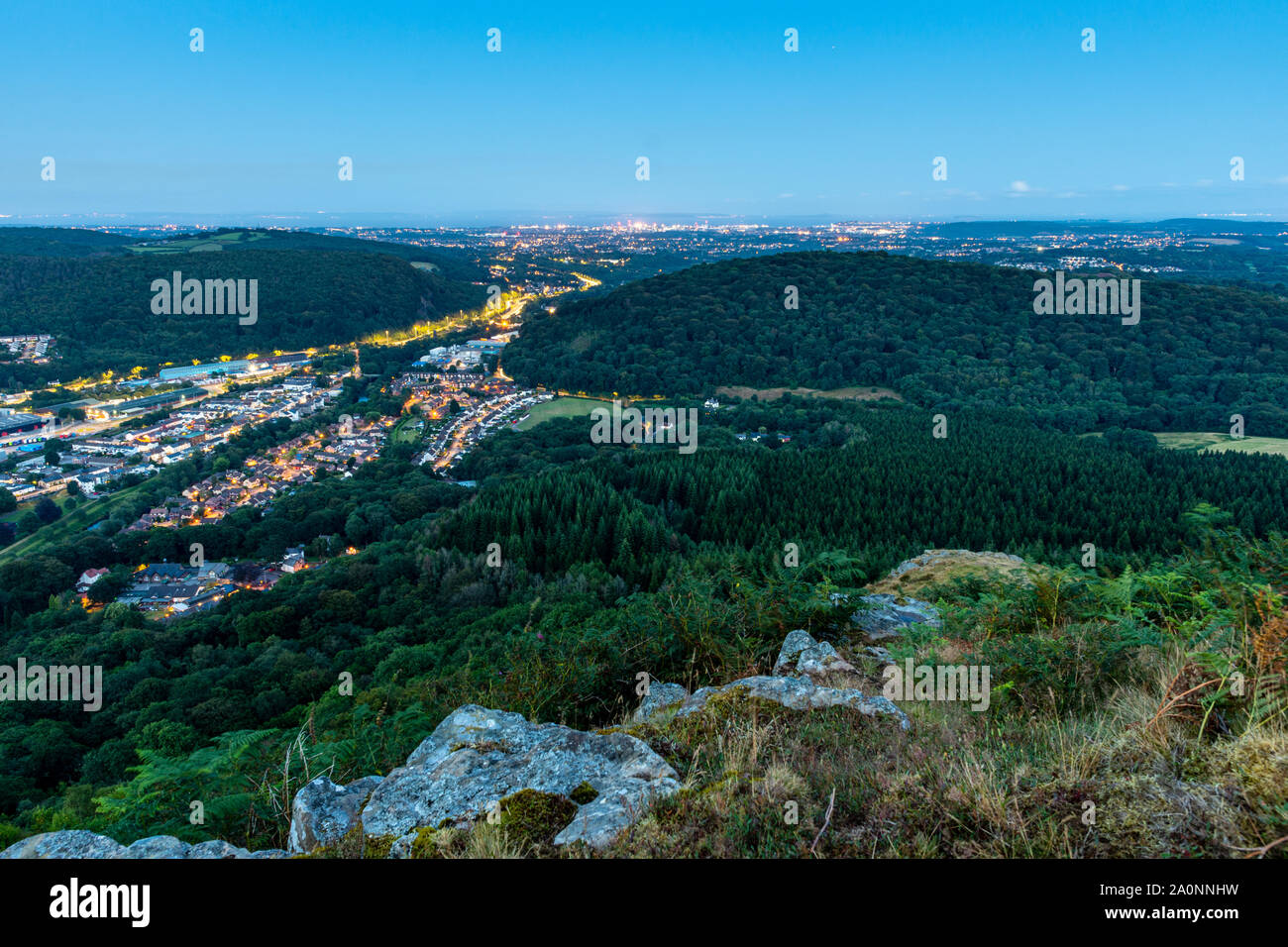 The town of Taff's Well and the cityscape of Cardiff are laid out below The Garth Mountain in South Wales. Stock Photo