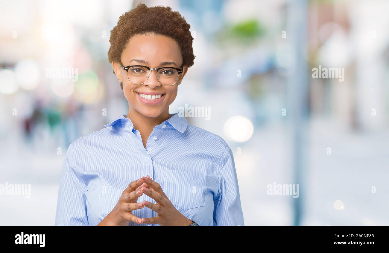 Young beautiful african american business woman over isolated ...