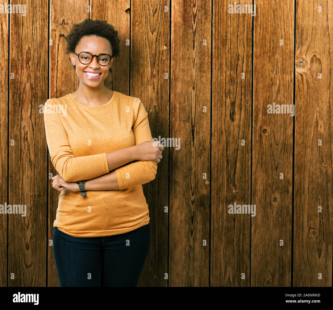 Young beautiful african american woman wearing glasses over isolated ...