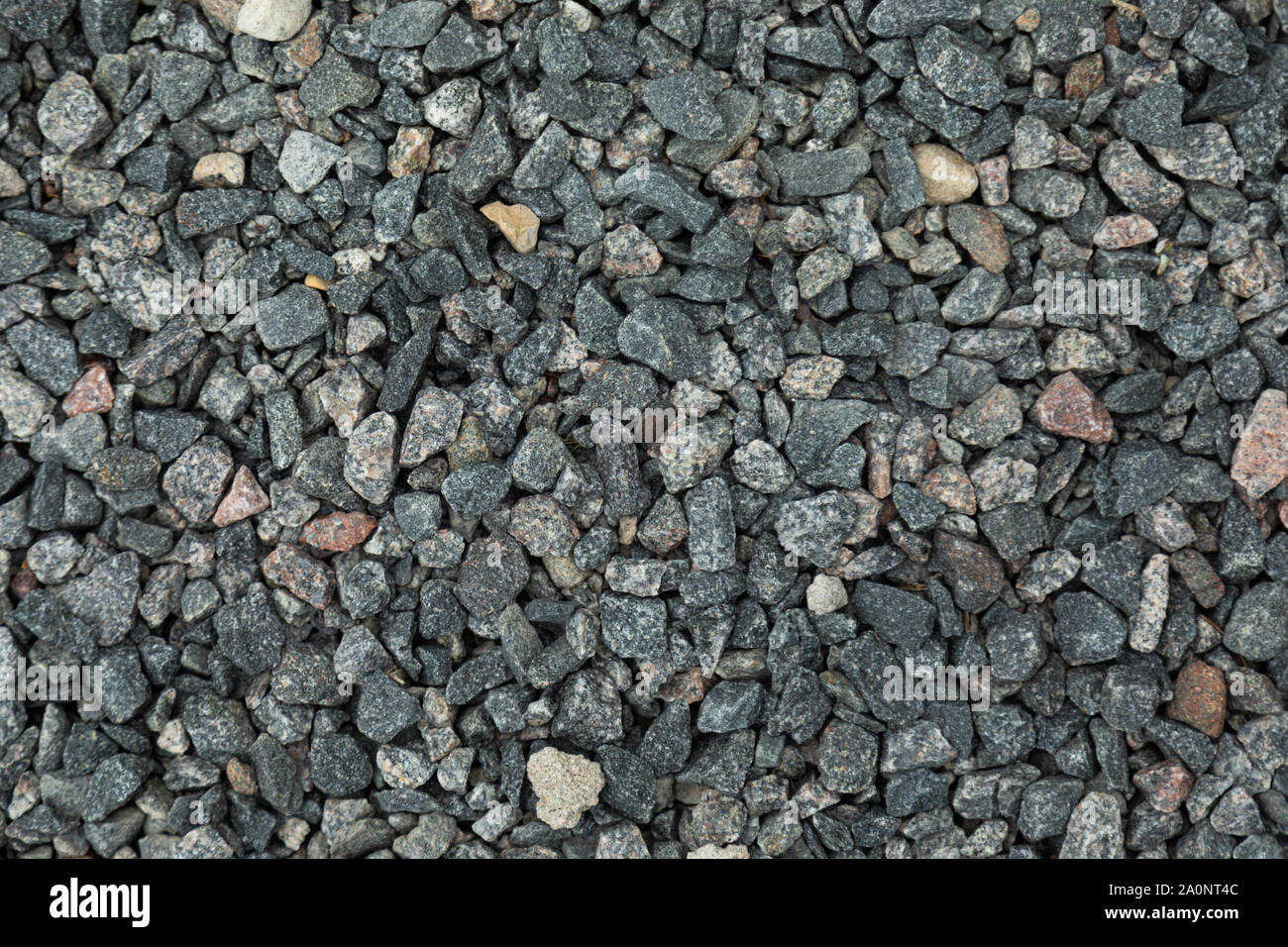 Closeup of dark grey gravel lying on ground Stock Photo Alamy