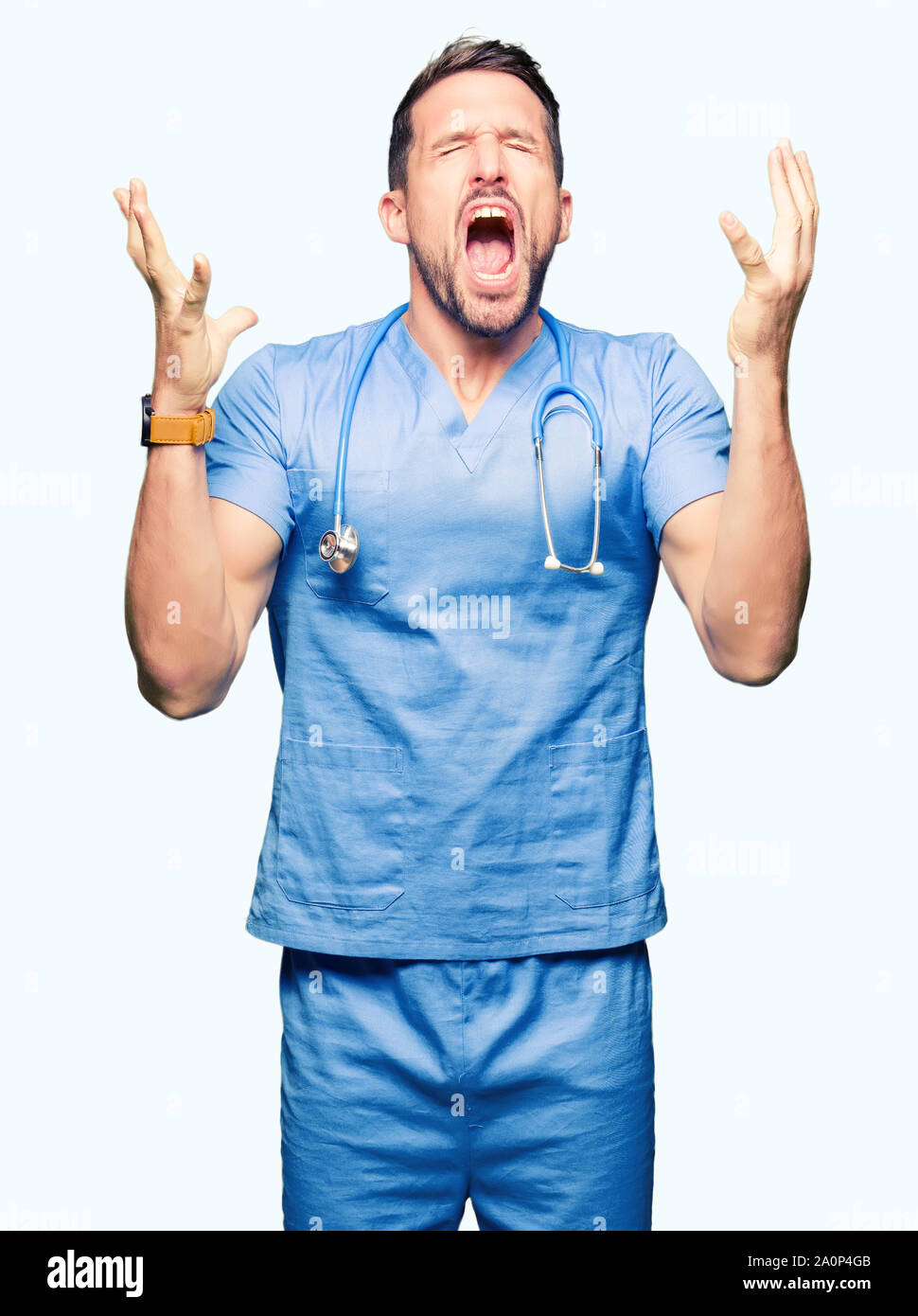 Handsome Doctor Man Wearing Medical Uniform Over Isolated Background Celebrating Mad And Crazy 8372