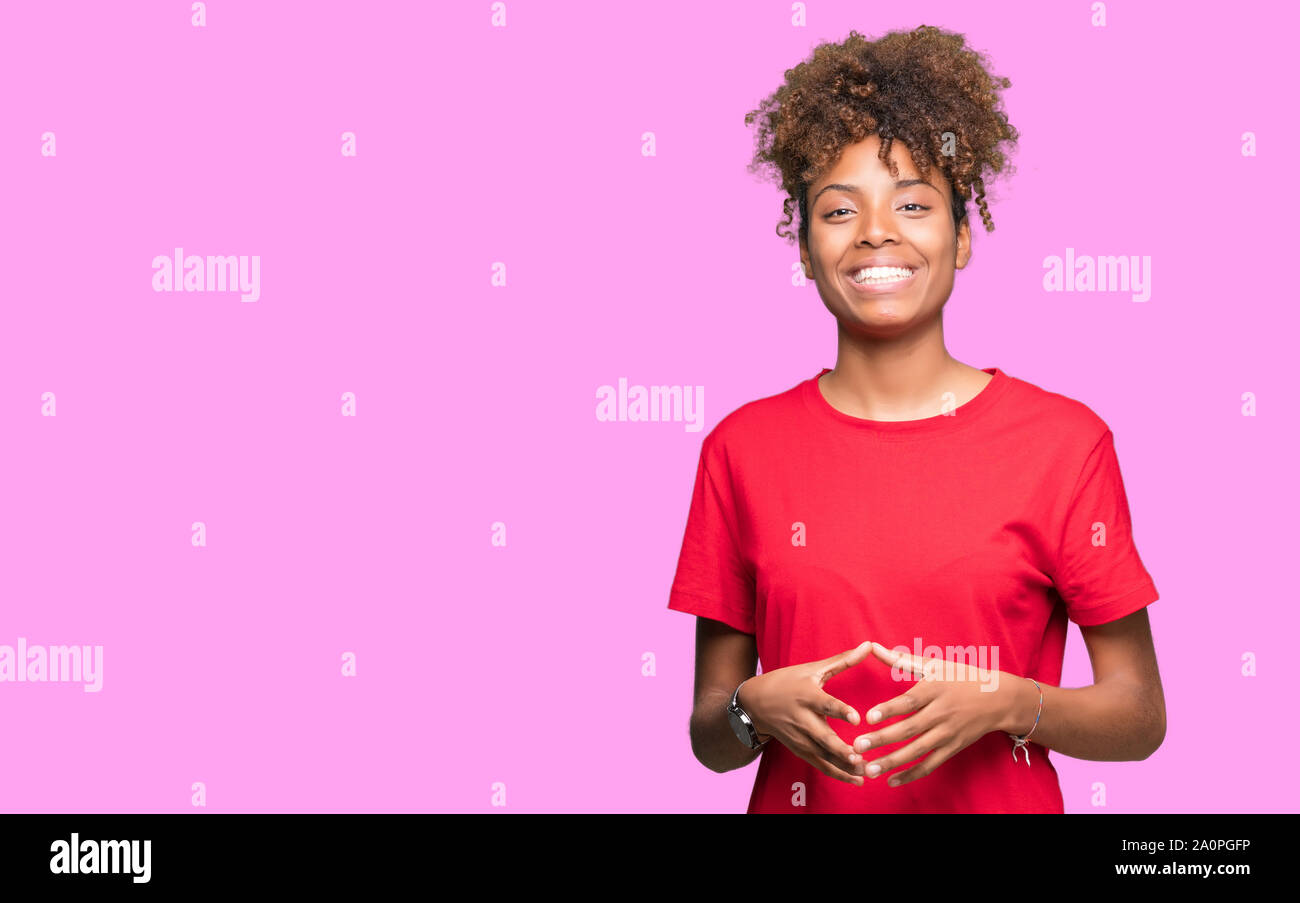 Beautiful young african american woman over isolated background Hands ...