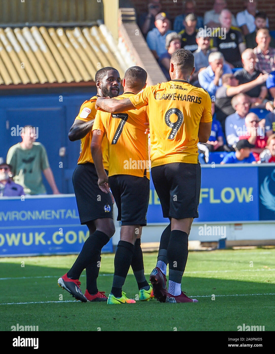 London UK 21 September 2019 - Abu Agogo of Bristol Rovers (left) is mobbed after scoring their first goal with a diving header during the Sky Bet League One football match between AFC Wimbledon and Bristol Rovers at the Cherry Red Records Stadium - Editorial use only. No merchandising. For Football images FA and Premier League restrictions apply inc. no internet/mobile usage without FAPL license - for details contact Football Dataco . Credit : Simon Dack TPI / Alamy Live News Stock Photo