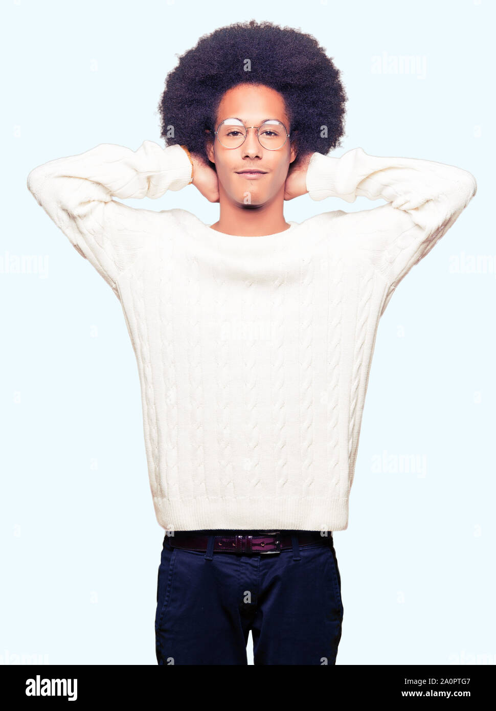 Young African American Man With Afro Hair Wearing Glasses Relaxing