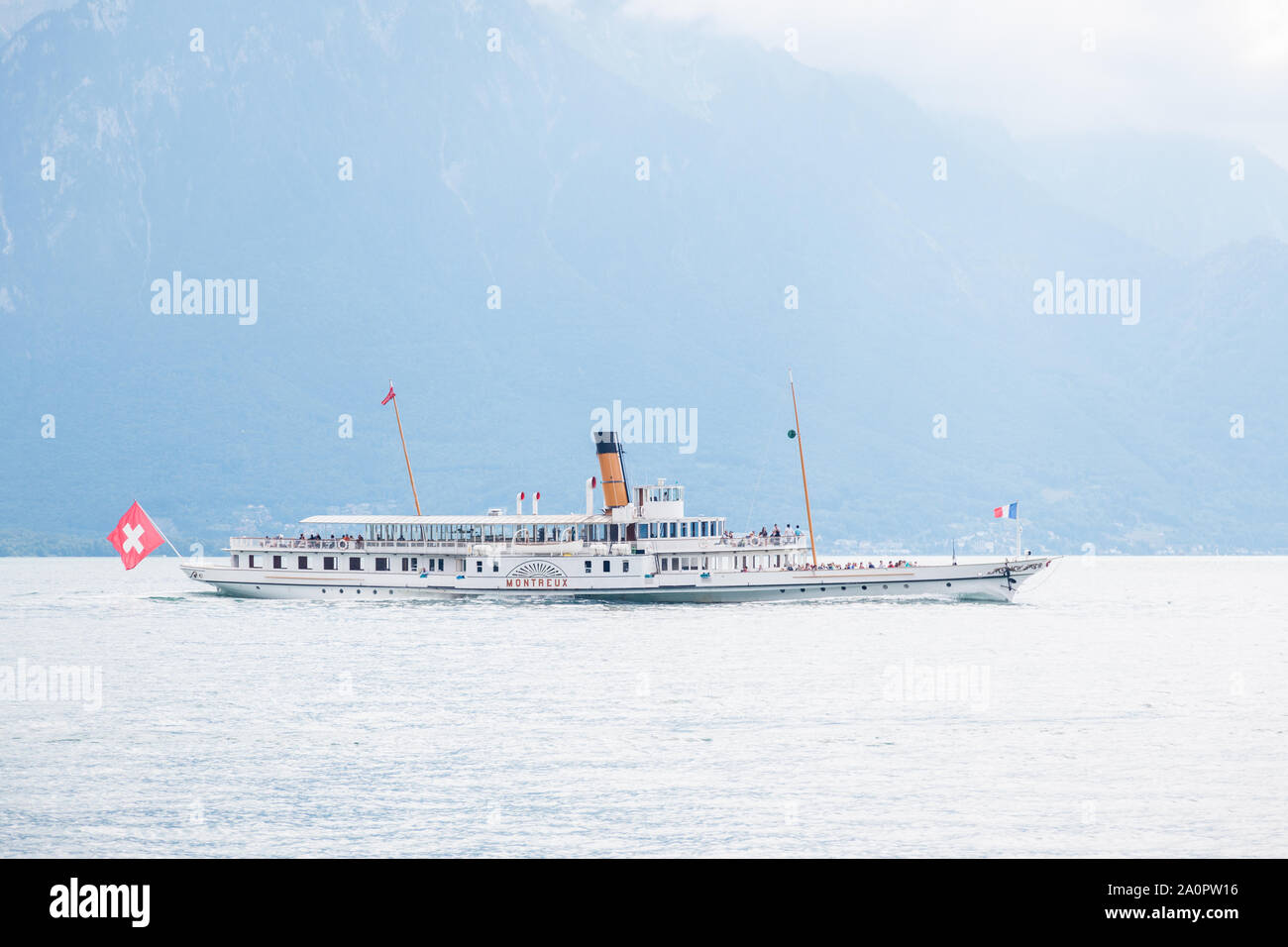 The oldest Belle Epoque steam paddle boat Montreux cruising on Lake Geneva (Lac Leman) on beautiful summer day Stock Photo
