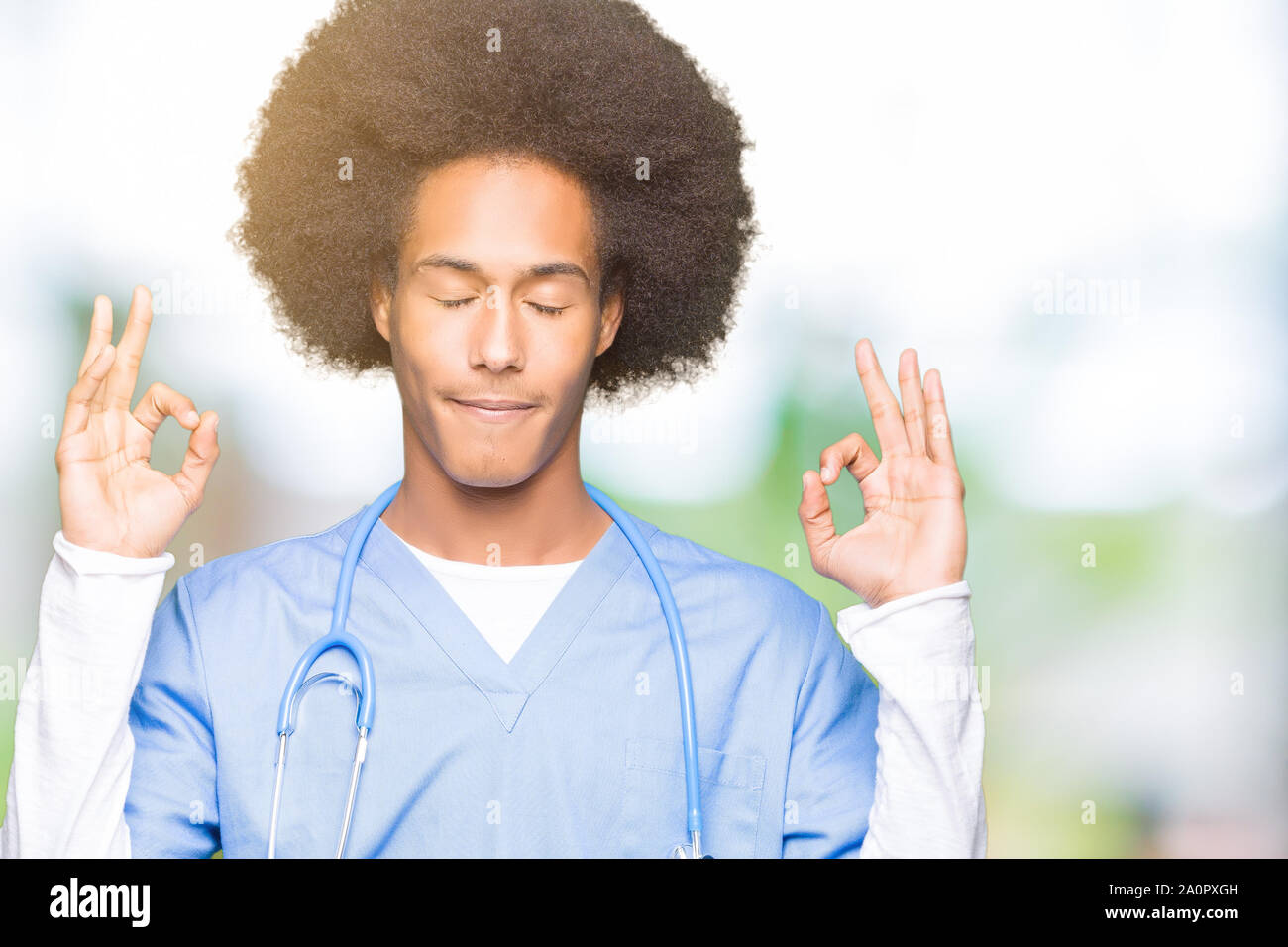 Young African American Doctor Man With Afro Hair Relax And Smiling
