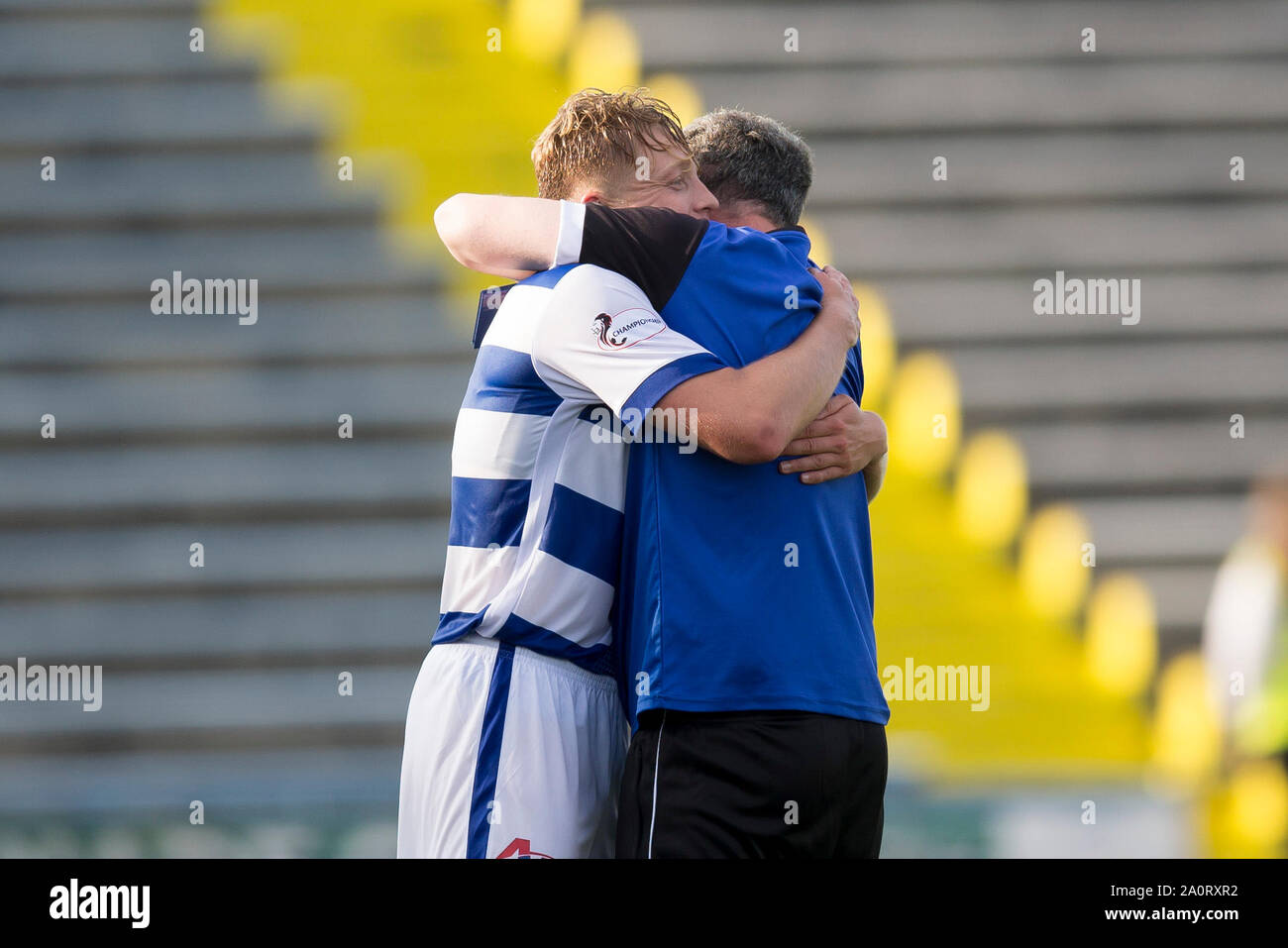 Greenock, Scotland, UK.  21st September 2019; Cappielow Park, Greenock, Inverclyde, Scotland; Scottish Championship Football, Greenock Morton Football Club versus Dundee Football Club; Greenock Morton assistant manager Anton McElhone hugs, scorer of the only goal, Peter Grant after the final whistle Credit: Action Plus Sports Images/Alamy Live News Credit: Action Plus Sports Images/Alamy Live News Stock Photo