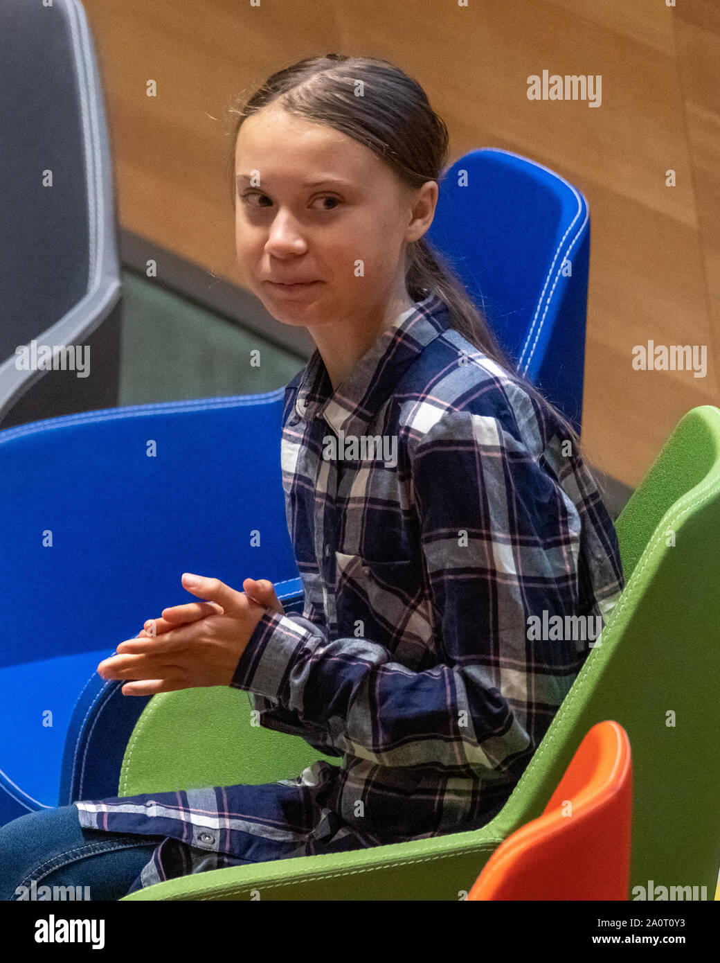 New York, USA,  21 September 2019.  Swedish environmental activist Greta Thunberg applauds at the start of the Youth Climate Summit at U.N. Headquarters in New York City.   Credit: Enrique Shore/Alamy Live News Stock Photo