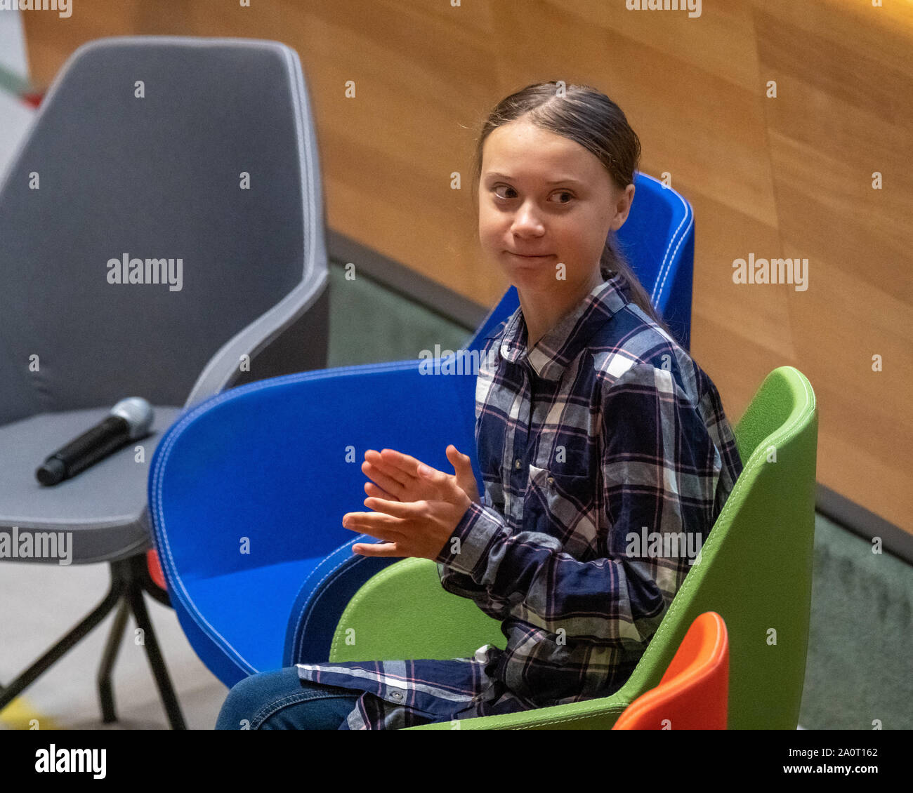 New York, USA,  21 September 2019.  Swedish environmental activist Greta Thunberg applauds at the start of the Youth Climate Summit at U.N. Headquarters in New York City.   Credit: Enrique Shore/Alamy Live News Stock Photo