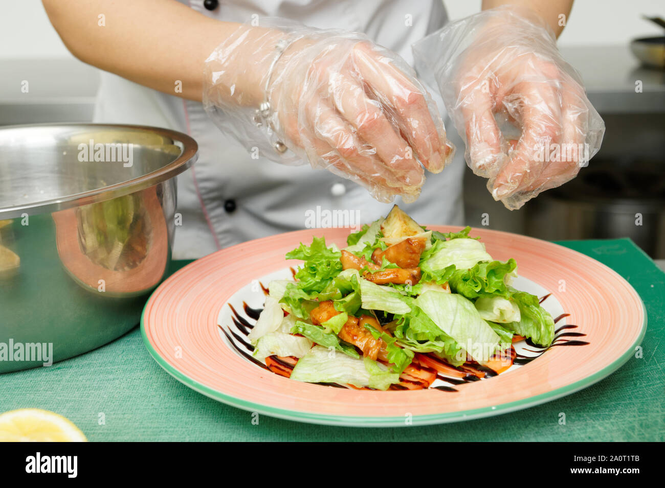 Chef is cooking appetizer at commercial kitchen Stock Photo - Alamy