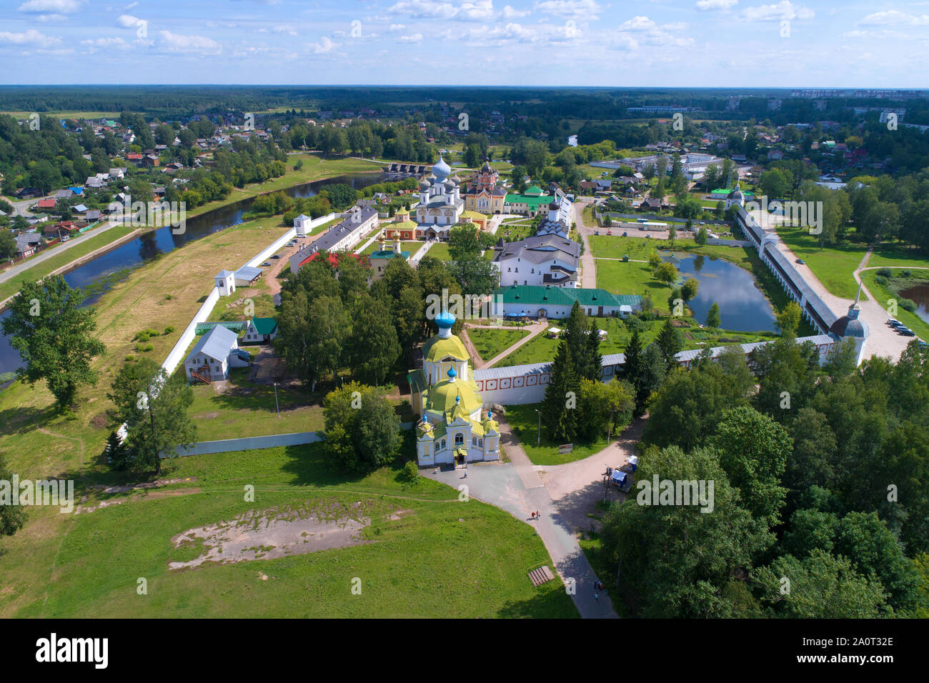 View of the Tikhvinsky Bogorodichny Uspensky monastery in the sunny July afternoon (shooting from the quadcopter). Tikhvin, Russia Stock Photo