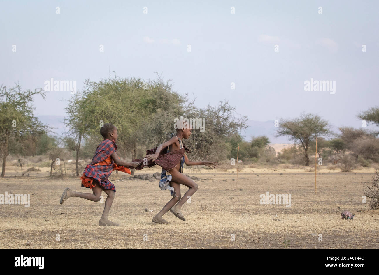 Arusha, Tanzania, 7th September 2019: maasai warriors playing soccer Stock Photo