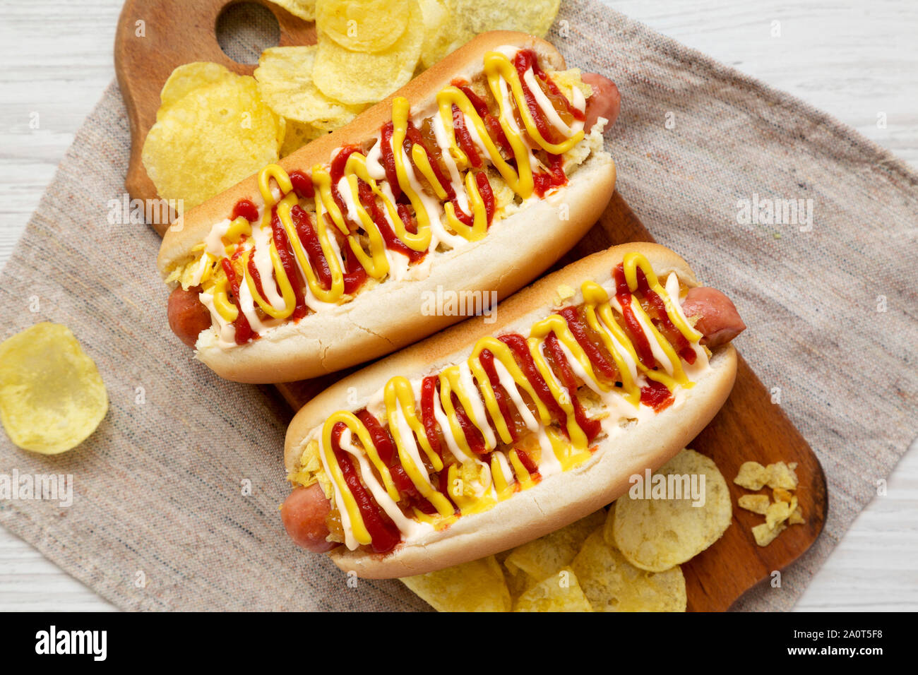 Homemade colombian hot dogs with pineapple sauce, yellow mustard and
