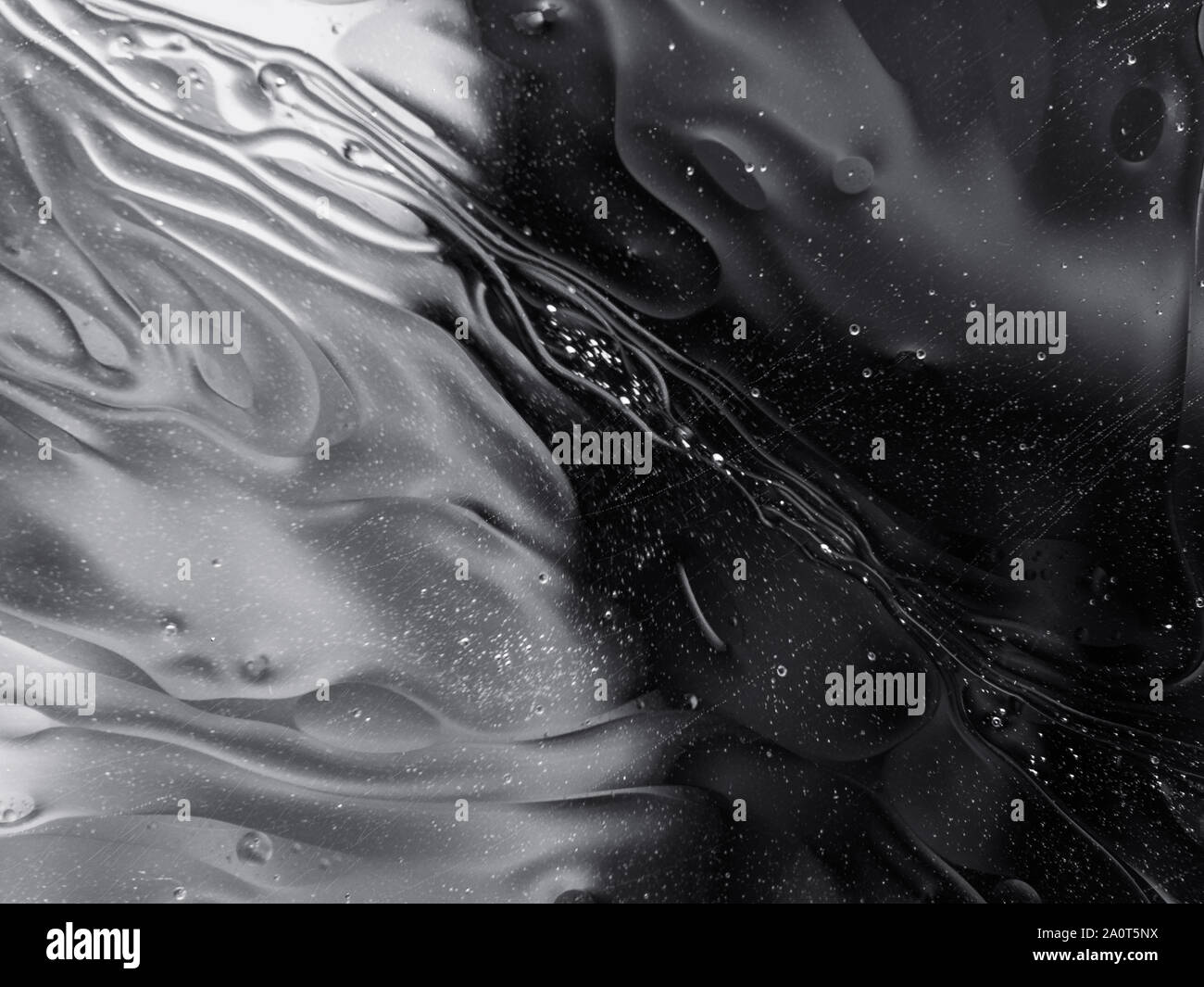 Black and white surreal abstract liquid background Stock Photo - Alamy
