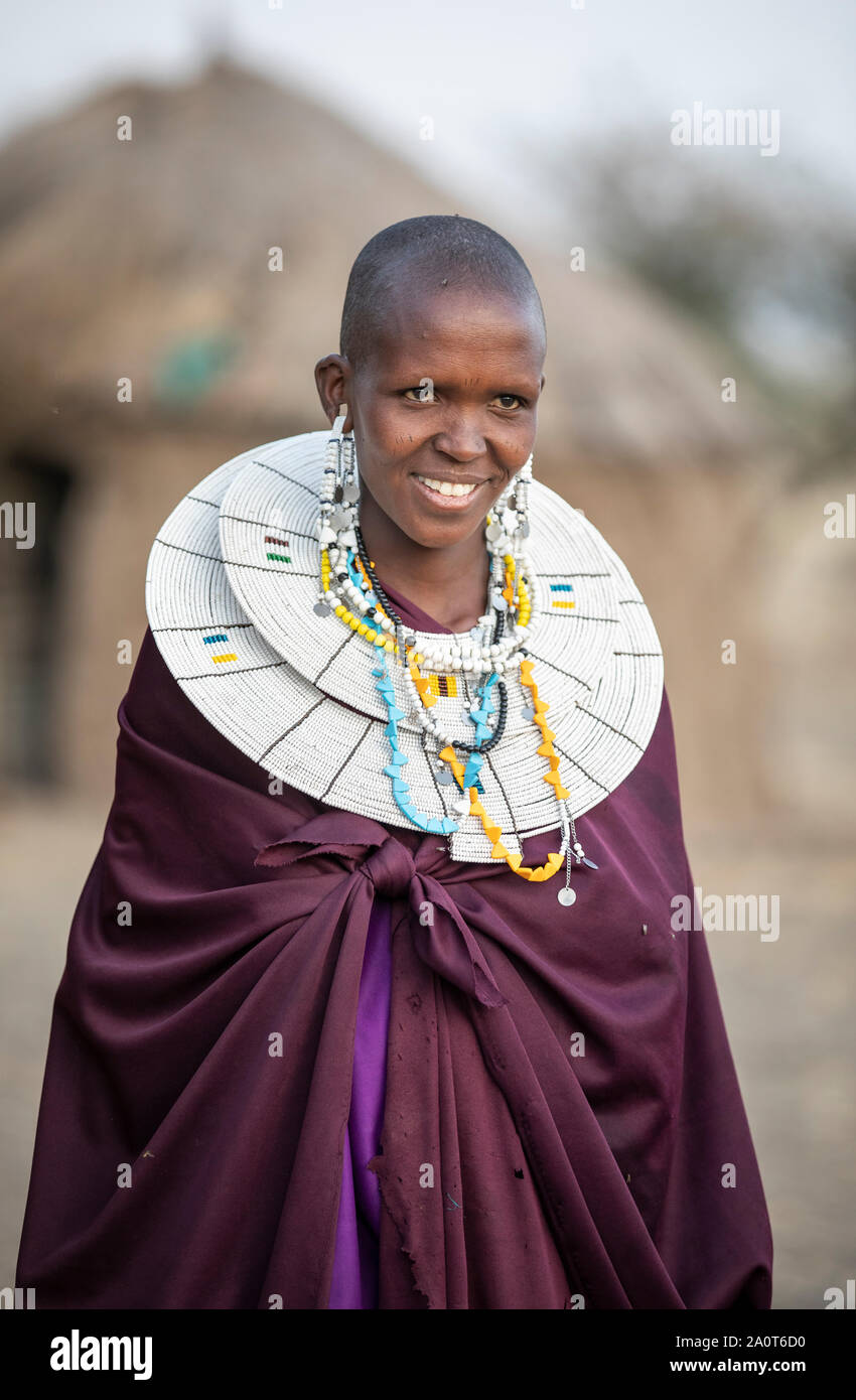 Arusha, Tanzania, 7th September 2019: Beautiful Maasai Women In Traditional  Clothing, Wearing Full Jewelry Stock Photo, Picture and Royalty Free Image.  Image 131860248.