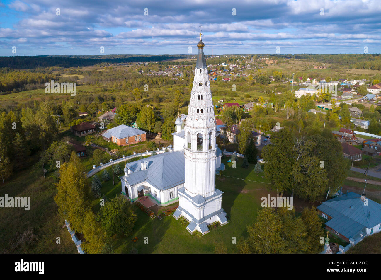 Belltower of the Savior Transfiguration Cathedral in the September afternoon (shooting from a quadrocopter). Sudislavl, Russia Stock Photo