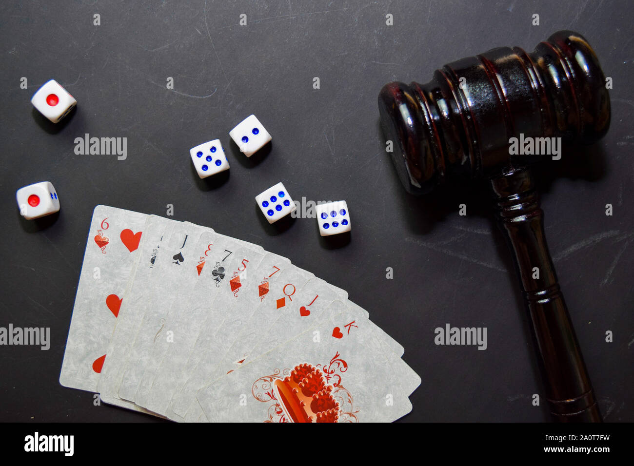 set of playing cards and Gavel isolated on black background. casino concept Stock Photo