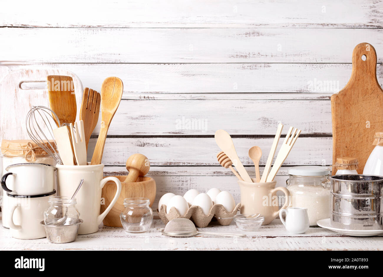 https://c8.alamy.com/comp/2A0T893/baking-kitchenware-and-baking-products-on-white-wooden-background-selective-focus-2A0T893.jpg