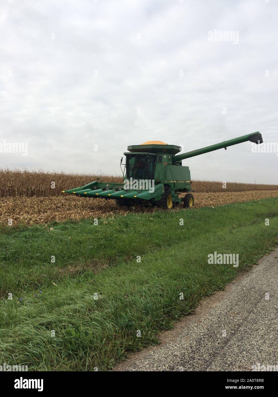 Central Illinois farmer harvesting corn in the fall Stock Photo