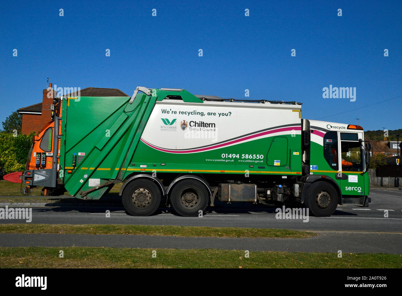 Rubbish collection lorry for Chiltern District Council and Wycombe District Council on a road in Buckinghamshire, UK. Stock Photo