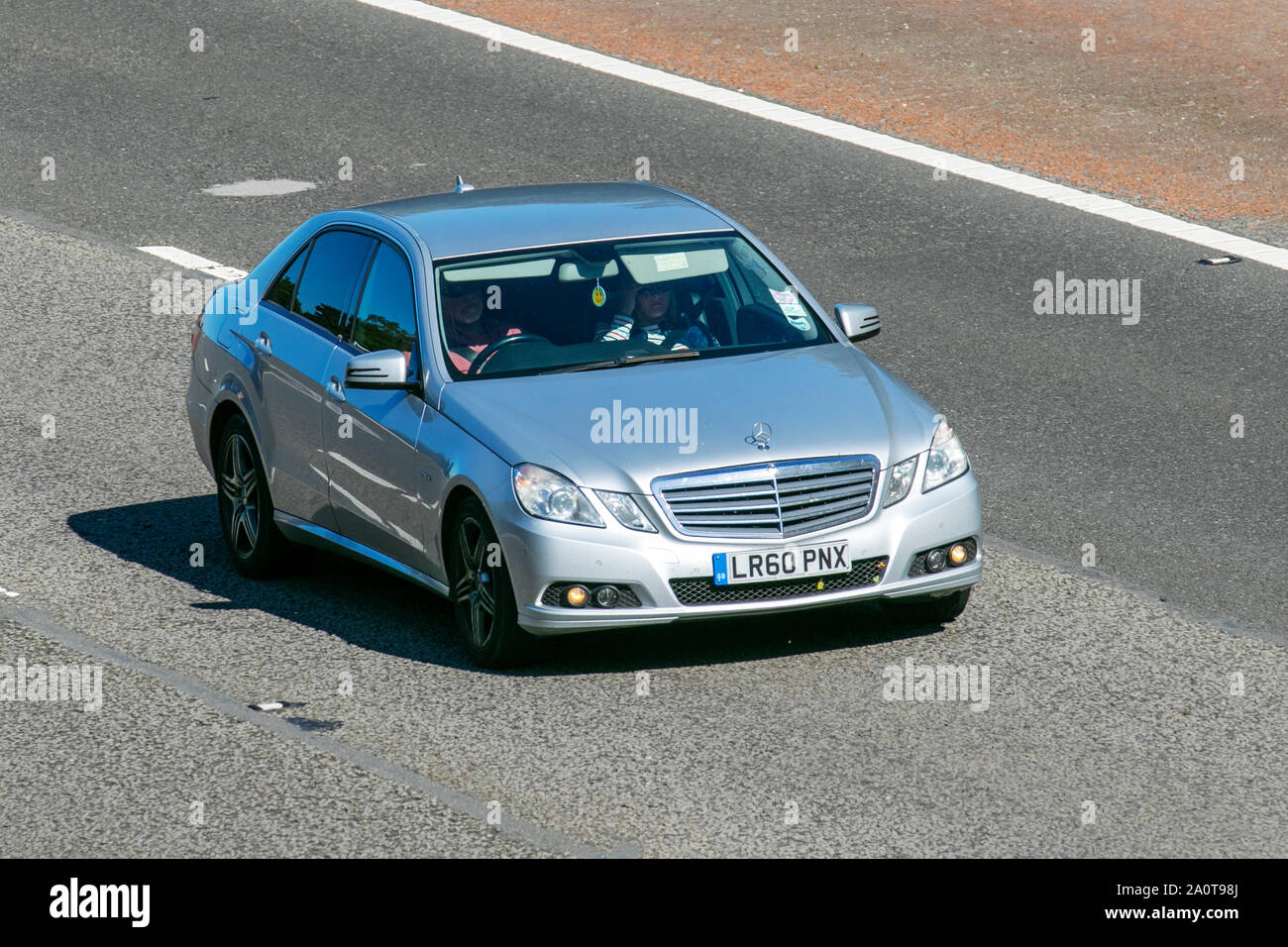 2010 silver Mercedes-Benz E200 Blue-Cy SE CDI A; UK Vehicular traffic,  transport, modern, saloon cars, south-bound on the 3 lane M6 motorway  highway Stock Photo - Alamy