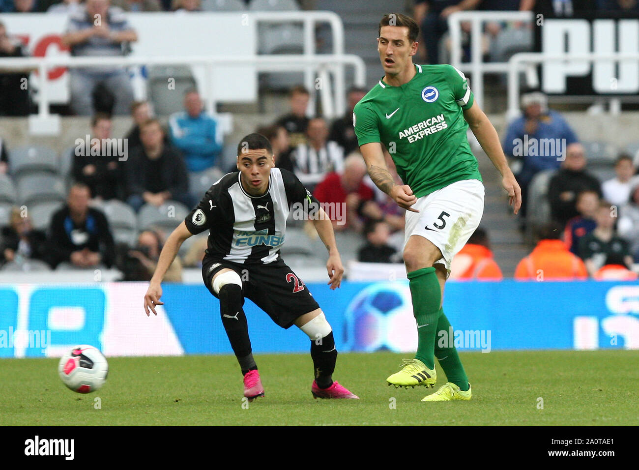 Newcastle, UK. 21st Sep, 2019.  Newcastle United's Miguel Almiron competes for the ball with Brighton & Hove Albion's Lewis Dunk during the Premier League match between Newcastle United and Brighton and Hove Albion at St. James's Park, Newcastle on Saturday 21st September 2019. (Credit: Steven Hadlow | MI News)Photograph may only be used for newspaper and/or magazine editorial purposes, license required for commercial use Credit: MI News & Sport /Alamy Live News Stock Photo