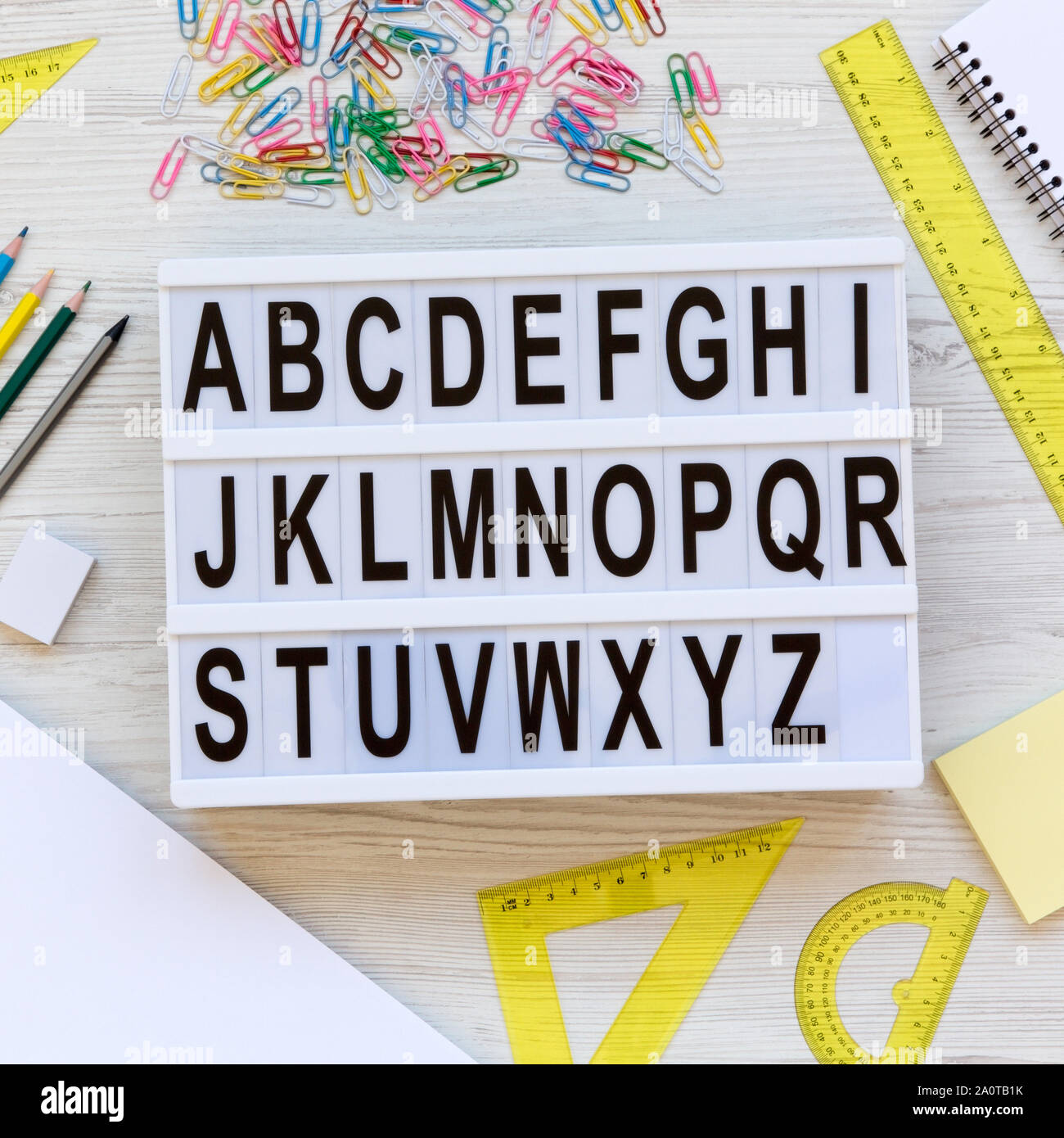 Back To School Concept Letters From A To Z English Alphabet On A Lightbox On A White Wooden Surface Top View From Above Flat Lay Overhead Stock Photo Alamy