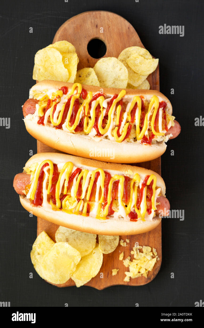 Homemade colombian hot dogs with pineapple sauce, yellow mustard and