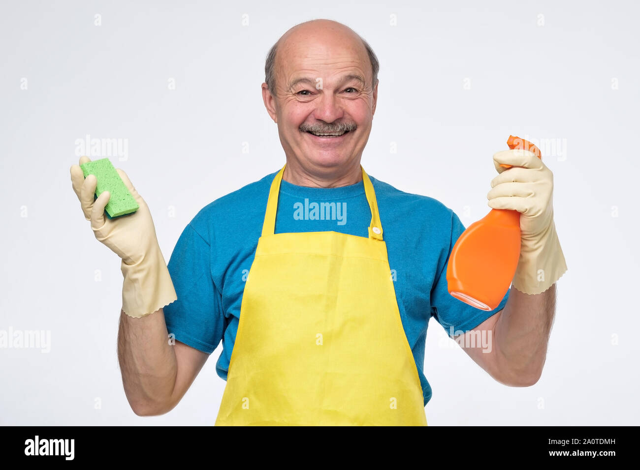 Professional senior hispanic smiling male from cleaning service ready ...