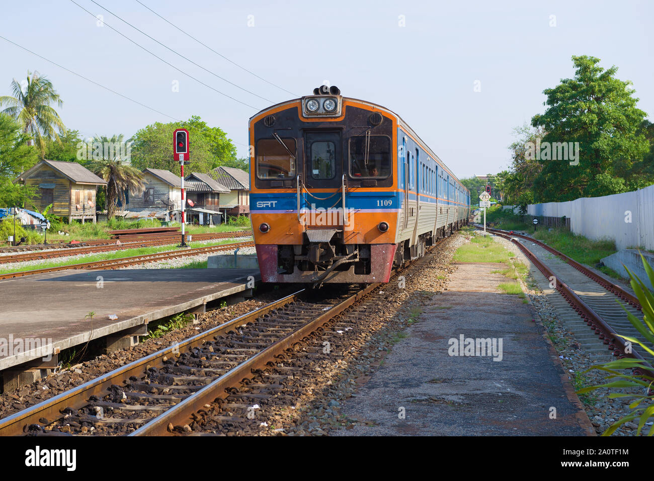 PHETCHABURI, THAILAND - DECEMBER 13, 2018: Passenger train arrives on the Phetchaburi railway station Stock Photo