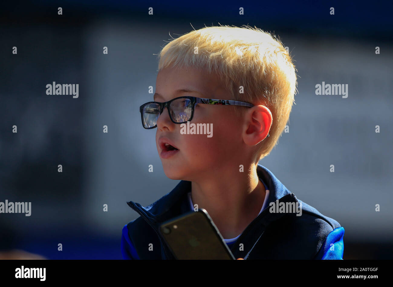 21st September 2019, Goodison Park, Liverpool, England ; Premier League Football, Everton vs Sheffield United : Young Everton fan awaits the arrival of the team bus Credit: Conor Molloy/News Images  English Football League images are subject to DataCo Licence Stock Photo