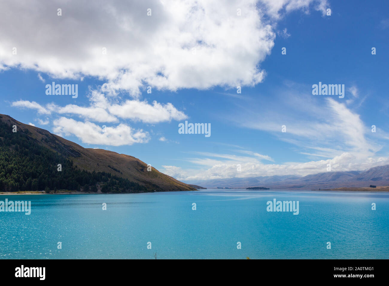 view of Tekapo lake on a sunny day, New Zealand Stock Photo - Alamy