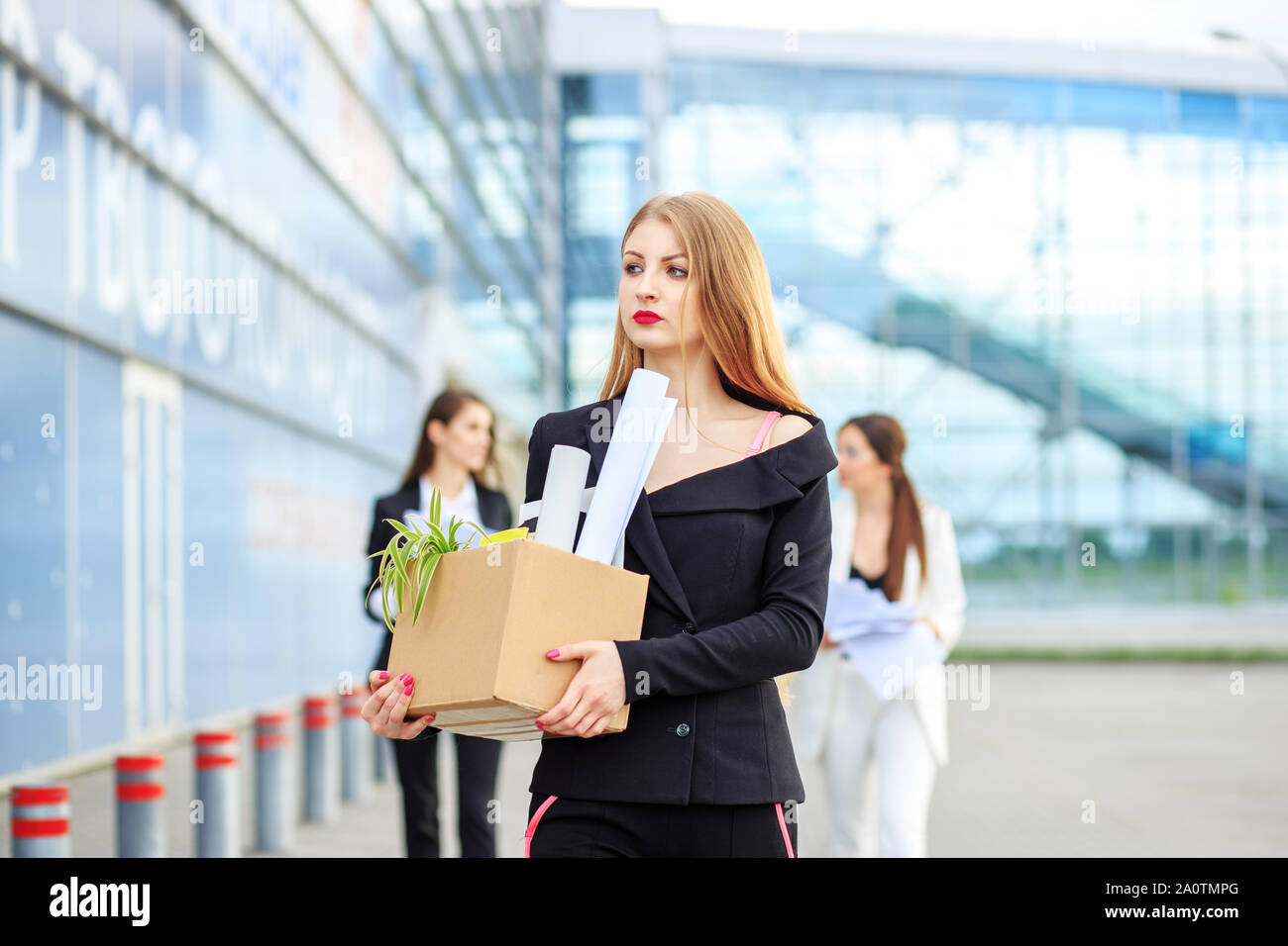 The woman was fired from her job. The end of a career. Concept for business, unemployment, labor exchange and dismissal. Stock Photo