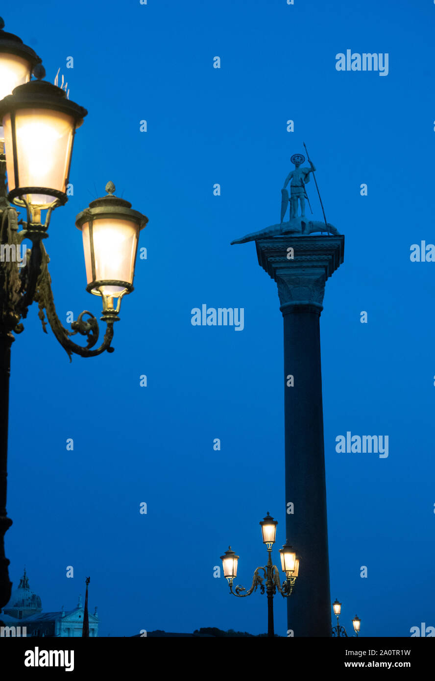Lamp post and St Theodore statue on column, Piazzetta, St Mark's Square ...