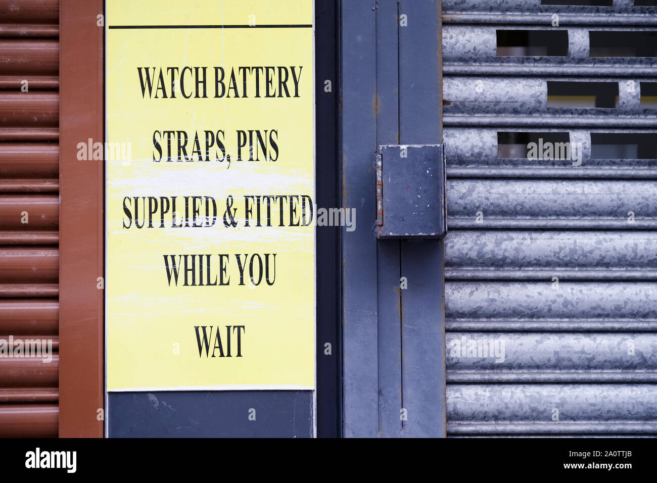 Watch battery strap repair shop sign Stock Photo Alamy