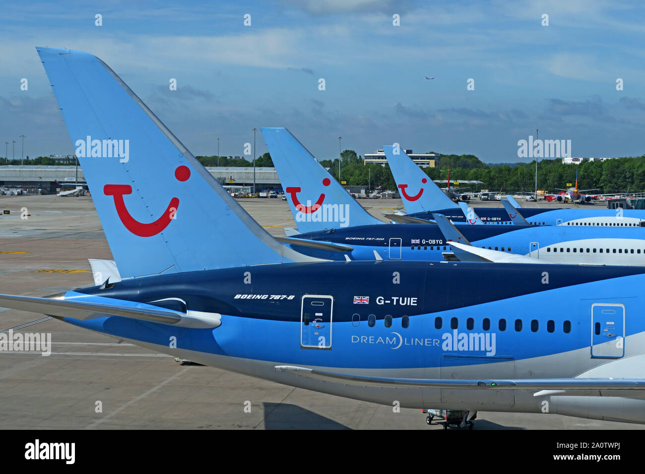Three TUI Holiday Group Aircraft - Manchester Ringway Airport, Greater Manchester, North West England, UK - 787-8 G-TUIE Dreamliner Stock Photo