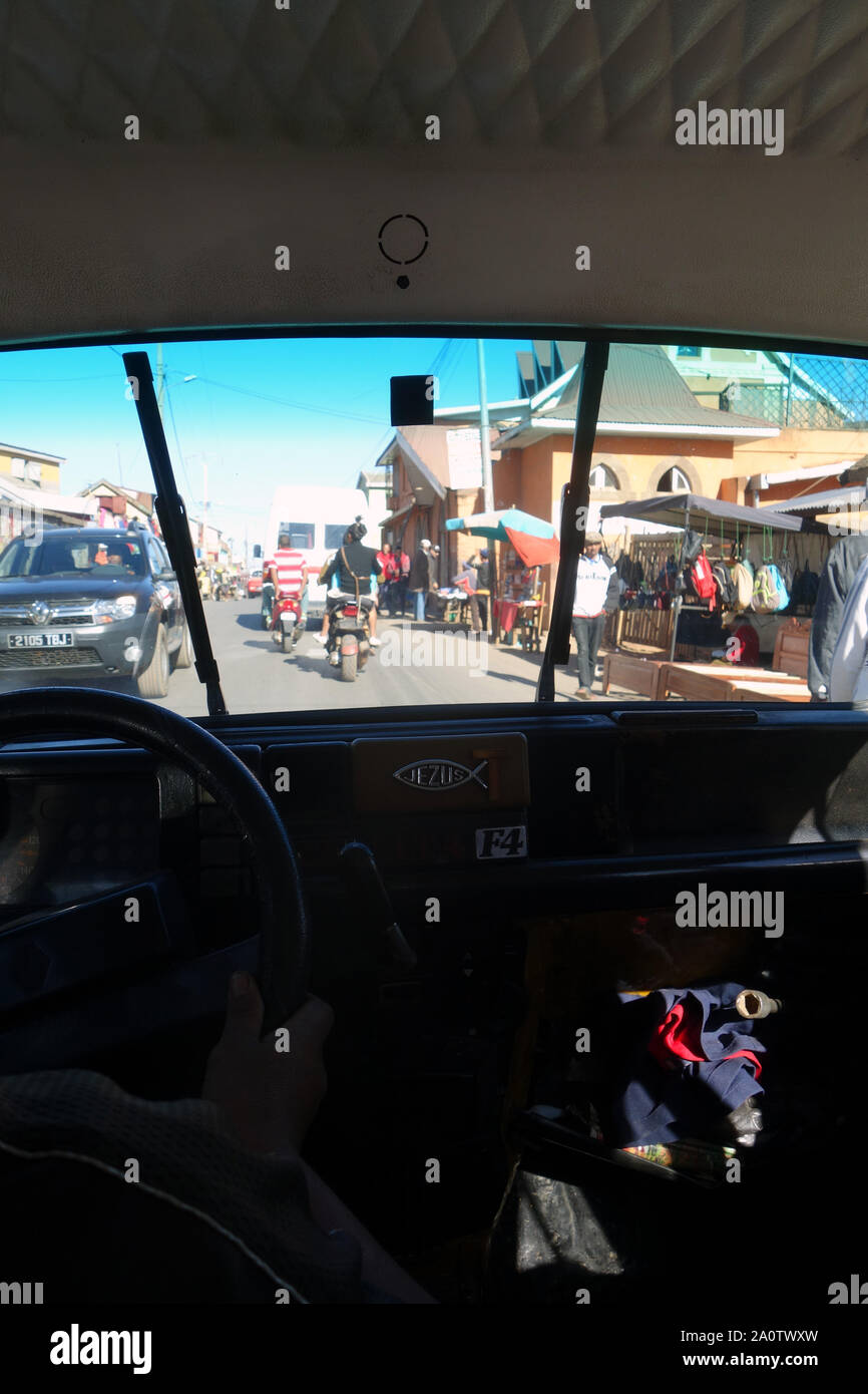 Arriving in crowded street in taxi in Ivato, Antananarivo, Madagascar. No MR or PR Stock Photo