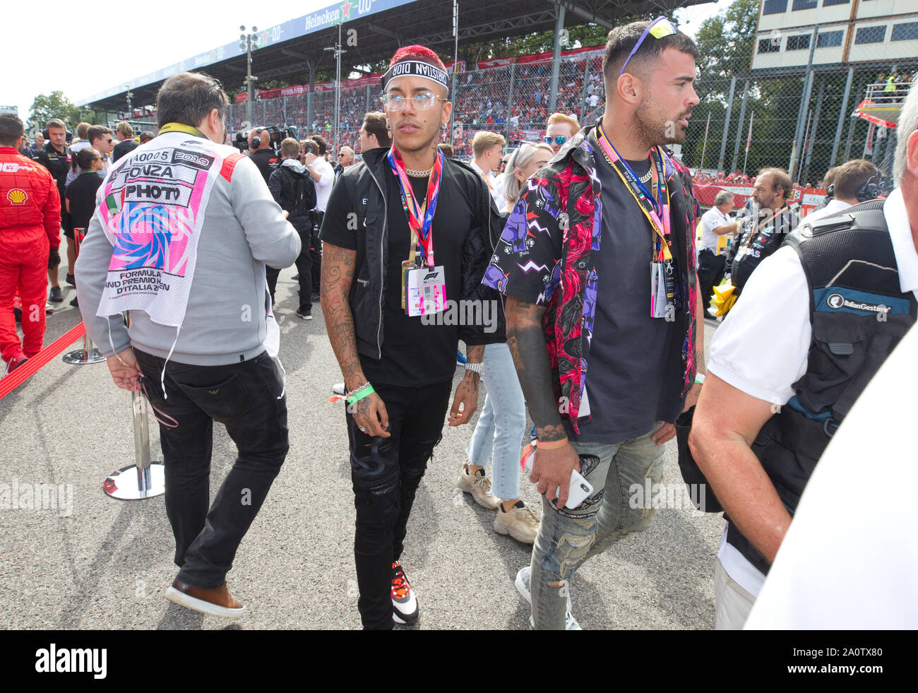 Milan, Sfera Ebbasta walks in the center The famous rapper SFERA EBBASTA  surprised to walk through the streets of the center. Here he is with  friends walking in Via Montenapoleone Stock Photo 