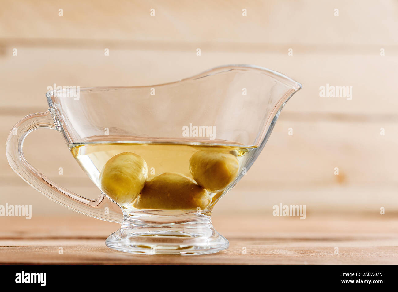 Download Olive Oil In A Clear Glass Oil Can With Olives Stock Photo Alamy PSD Mockup Templates
