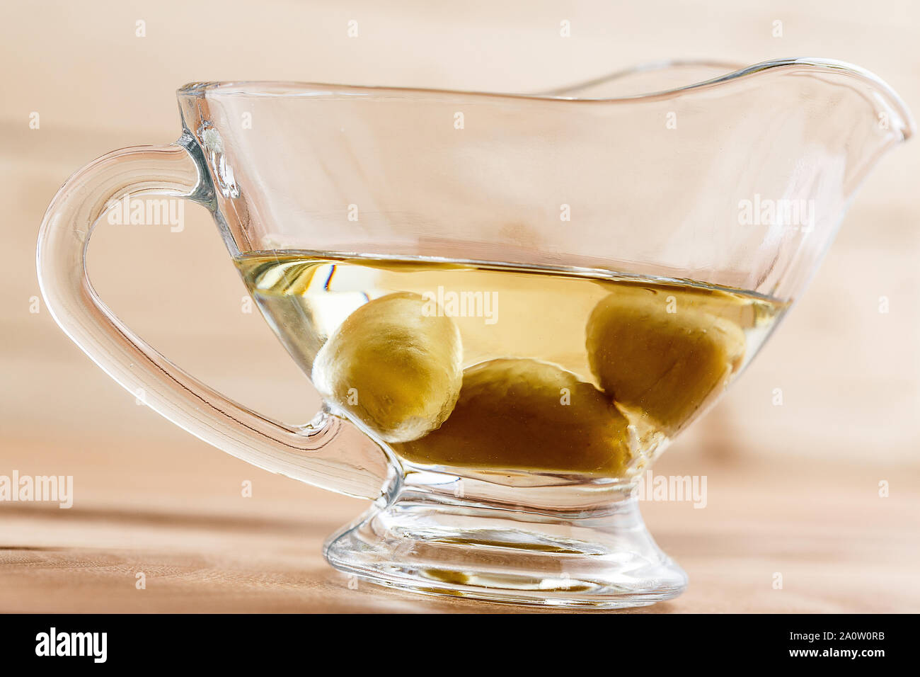 Download Olive Oil In A Clear Glass Oil Can With Olives Stock Photo 327546447 Alamy PSD Mockup Templates