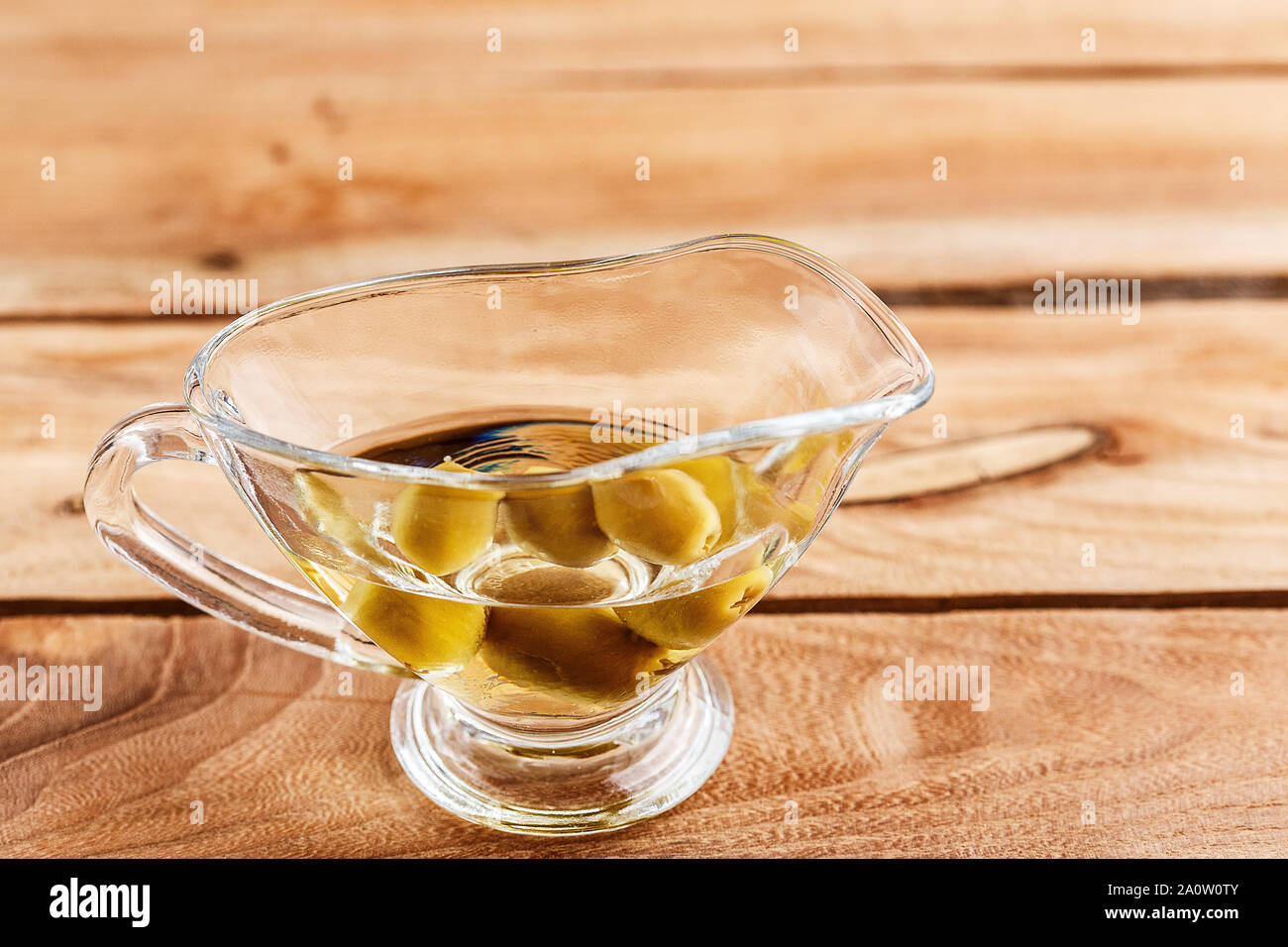 Download Olive Oil In A Clear Glass Oil Can With Olives Stock Photo Alamy Yellowimages Mockups