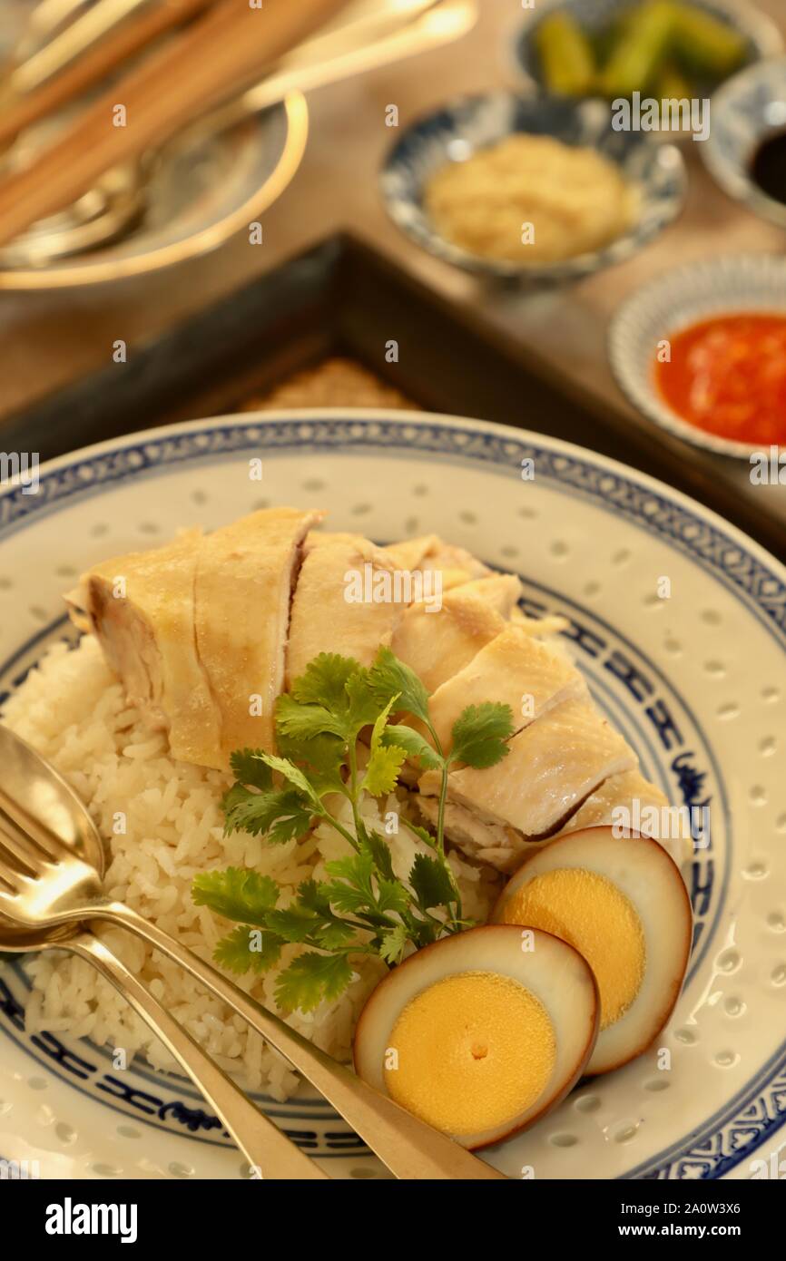 Hainanese Chicken Rice. Fragrant rice cooked in chicken broth; then