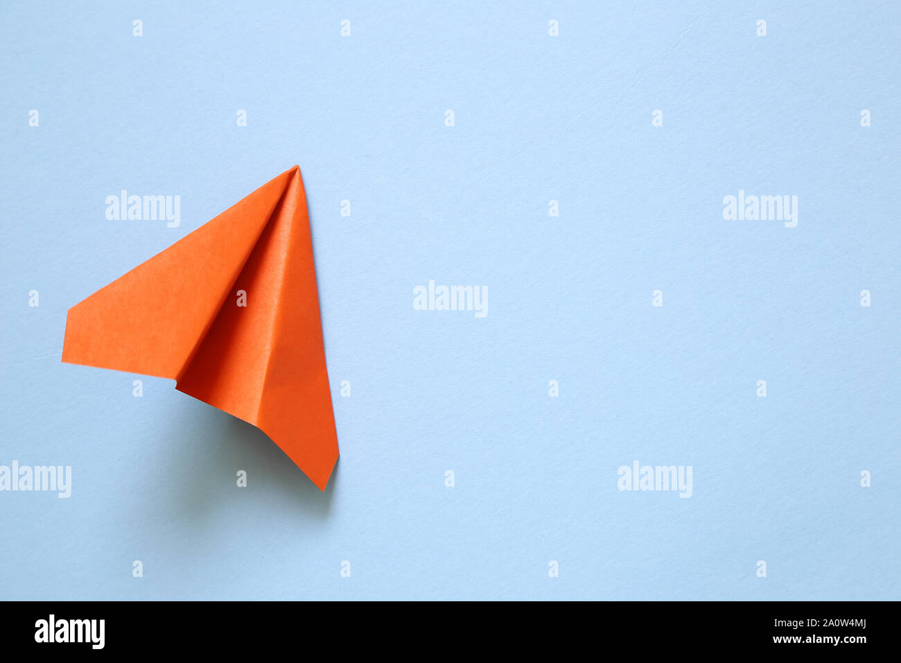 Kid holding a paper and orange hi-res stock photography and images - Alamy