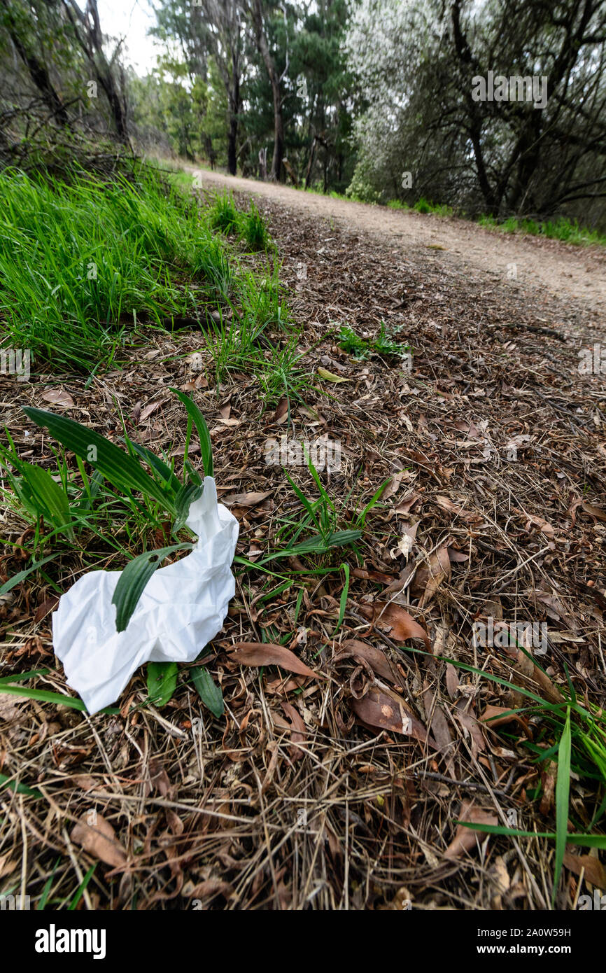 Discarded Wipes litter the bicycle track Stock Photo