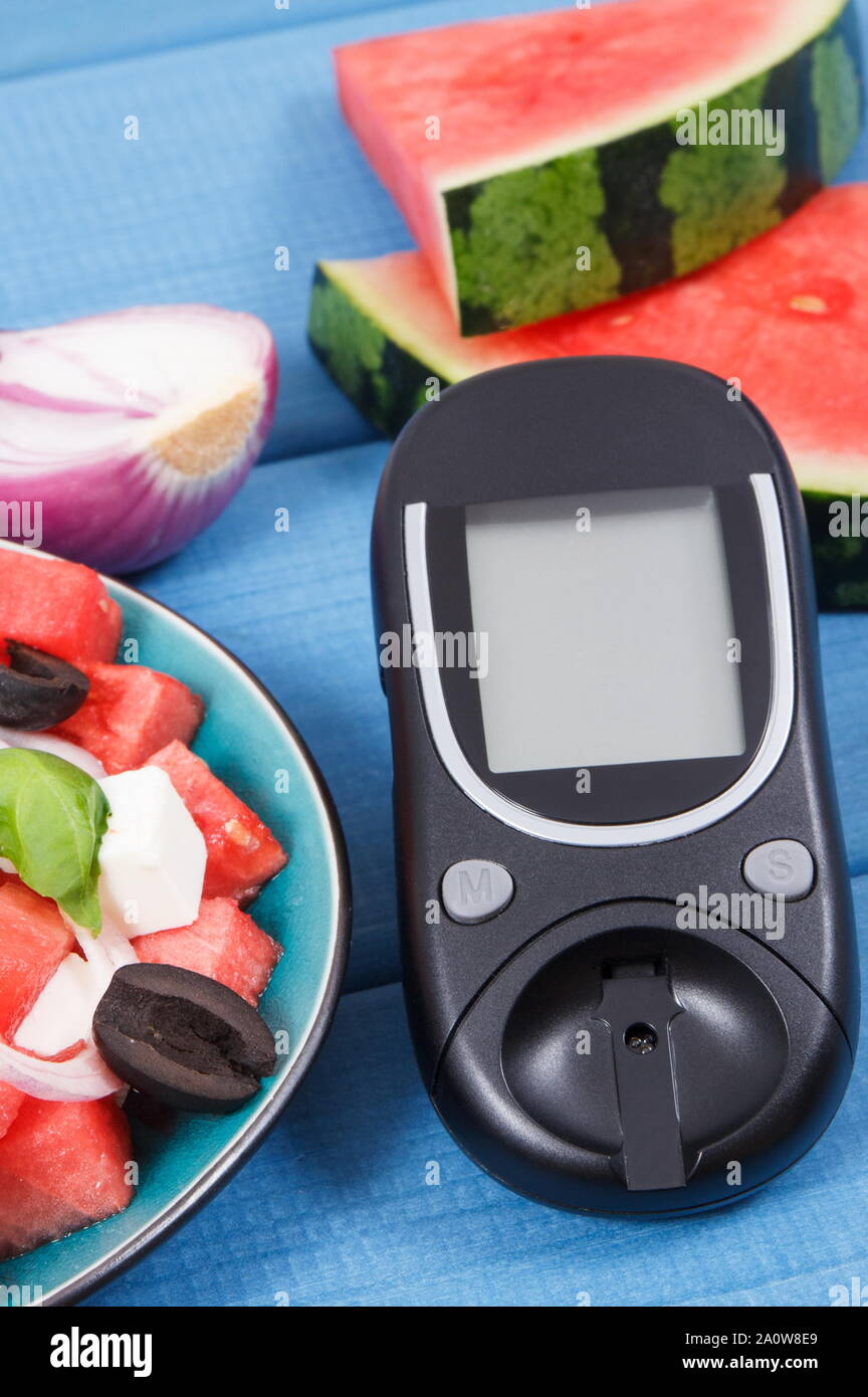 for checking sugar level and summer salad of watermelon with feta cheese. Slimming