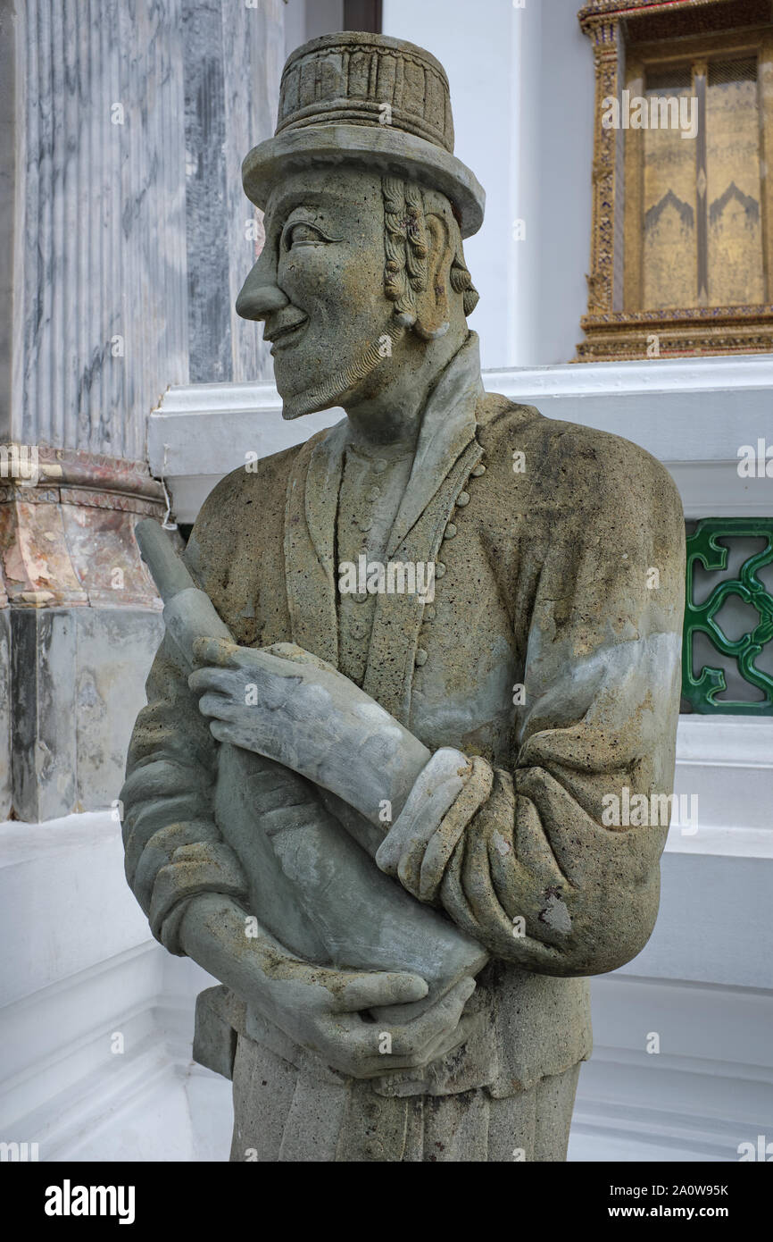 The statue of a European, colonial-era soldier armed with a rifle ...